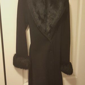 Evening gown over coat.